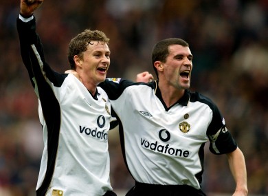 Ole Gunnar Solskjaer celebrates with Roy Keane after a Manchester United goal in 2002.