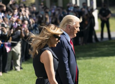The US President and first lady Melania Trump depart the White House.