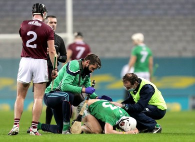 Aaron Gillane receives medical attention late in the game.