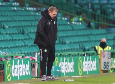 Neil Lennon reacts to Celtic's latest wretched defeat.