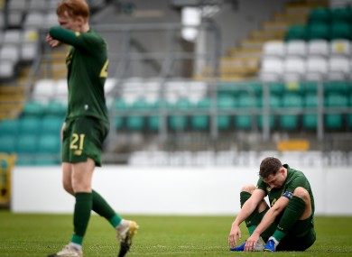 Ireland’s Conor Masterson and Liam Scales dejected after the match.