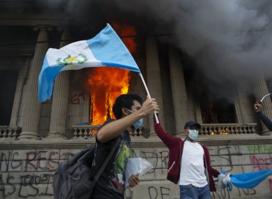 Protesters set fire to part of Guatemala's congress building