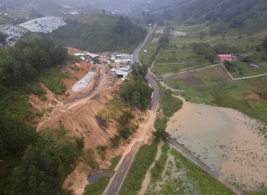 A landslide blocks a road after Storm Eta rips through northern Guatemala