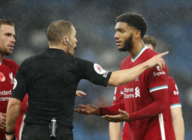 Liverpool's Joe Gomez (right) appeals to referee Craig Pawson.