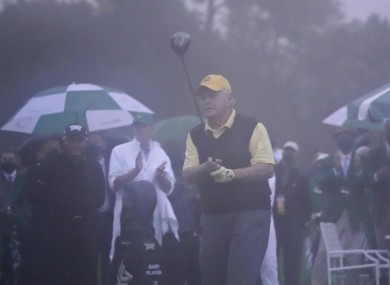 Jack Nicklaus hits the ceremonial opening drive in the Augusta rain.
