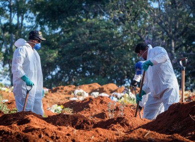 Cemetery workers at the Vila Formosa cemetery during the Covid-19 pandemic