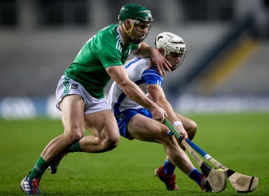 Seán Finn tackling Dessie Hutchinson.