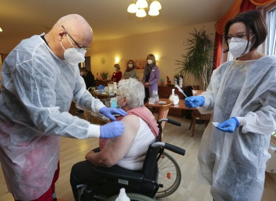 A nursing home resident is vaccinated in Halberstadt, Germany