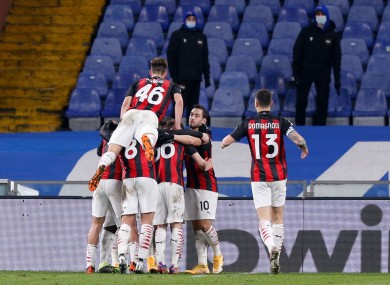 Frank Kessie and team-mates celebrate Milan's opening goal.