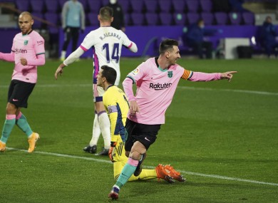 Lionel Messi celebrates after scoring his side's third goal, a record-breaker for the Argentinian as an individual.