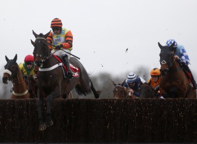 Might Bite clears an early face in Kempton in 2017.