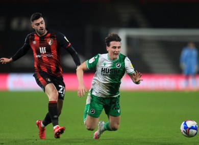 Danny McNamara is fouled by Bournemouth's Diego Rico.