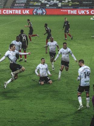 Conor Hourihane and his Swansea team-mates celebrate.