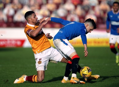 Motherwell's Jake Carroll challenging Ianis Hagi of Rangers during last weekend's Scottish Premiership fixture.