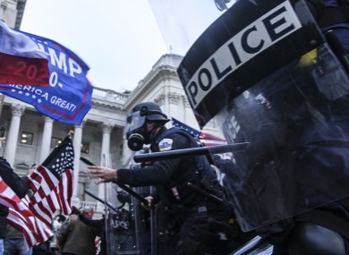 Members of the US police clashing with pro-Trump supporters on Wednesday.