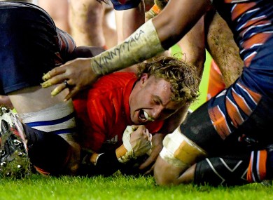 Munster's Craig Casey scores a try.