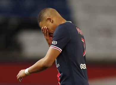 Kylian Mbappe reacts during PSG's shock defeat to Monaco