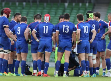 The French team in a huddle in Dublin during the second round win over Ireland.