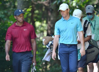 Tiger Woods and Rory McIlroy during the final round of The Northern Trust golf tournament last year.