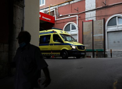 An ambulance leaves the emergency entrance of the Sao Jose Hospital in Lisbon