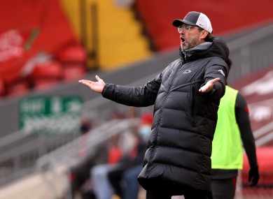 Liverpool manager Jurgen Klopp gestures on the sideline during his side's defeat to Fulham this afternoon.