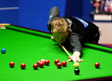 England's Kyren Wilson plays a shot during day 13 of the Betfred World Snooker Championships 2021 at The Crucible.