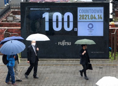 A countdown clock in Tokyo on Wednesday shows 100 days to go until the Games.