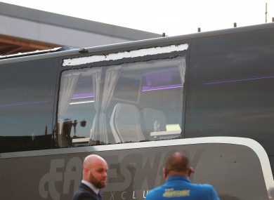 A photo showing the damage to a window on the Real Madrid team bus.