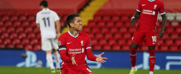 Liverpool's Roberto Firmino rues a missed chance.