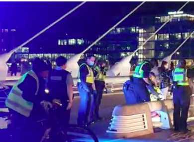 Gardaí at the scene of an attack on the Samuel Beckett Bridge last Monday.