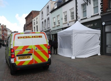 A police tent outside The Clean Plate cafe in Southgate Street, Gloucester