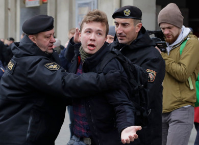 Raman Pratasevich is arrested during an earlier protest.