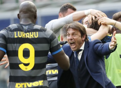 Antonio Conte celebrates with Romelu Lukaku after last week's win.