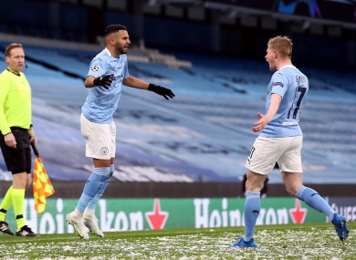 Riyad Mahrez celebrates with Kevin De Bruyne.