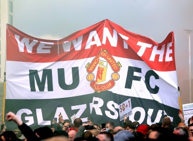 A banner held aloft during yesterday's protests at Old Trafford.