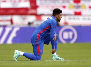 England's Jadon Sancho takes a knee before the friendly match at Riverside Stadium.