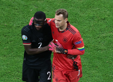 Germany's Antonio Rudiger and goalkeeper Manuel Neuer (r) celebrate.