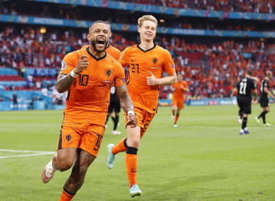 Memphis Depay celebrates opening the scoring.