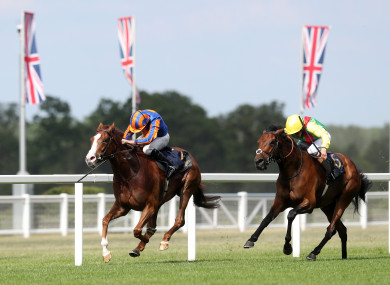 Love and Ryan Moore (left) coming home to win the Prince Of Wales' Stakes.