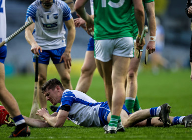 Waterford’s Tadhg De Burca goes down in the final.