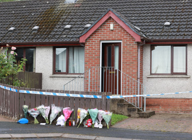 Flowers at the scene where the two-year-old child was found on Friday in Dungannon, Co Tyrone