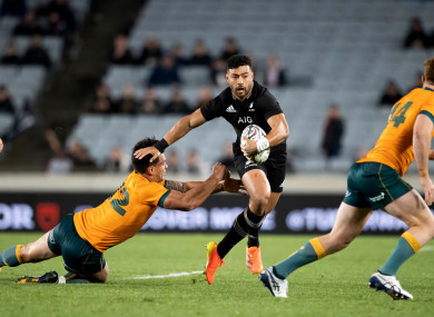 All Blacks’ Richie Mo’unga tries to evade a tackle.