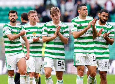 Celtic players applaud supporters at the end of the draw with Dundee United.