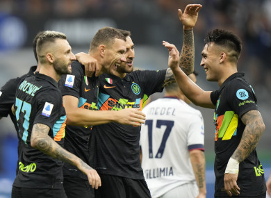 Inter Milan players celebrate a goal by Edin Dzeko.