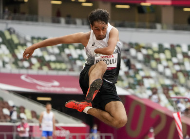 Afghanistan's Hossain Rasouli competing in the men's T47 long jump during the Paralympics.