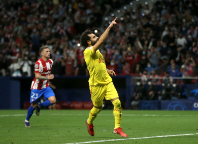 Salah celebrates scoring one of his goals.
