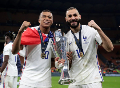 Benzema (right) celebrates Sunday's Nations League final win with Kylian Mbappé.