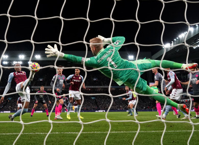 Ezri Konsa looks on as he scores against Leicester.