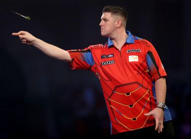 Daryl Gurney pictured competing against Rob Cross.