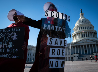 Protesters standing near the US Capitol in Washington DC.